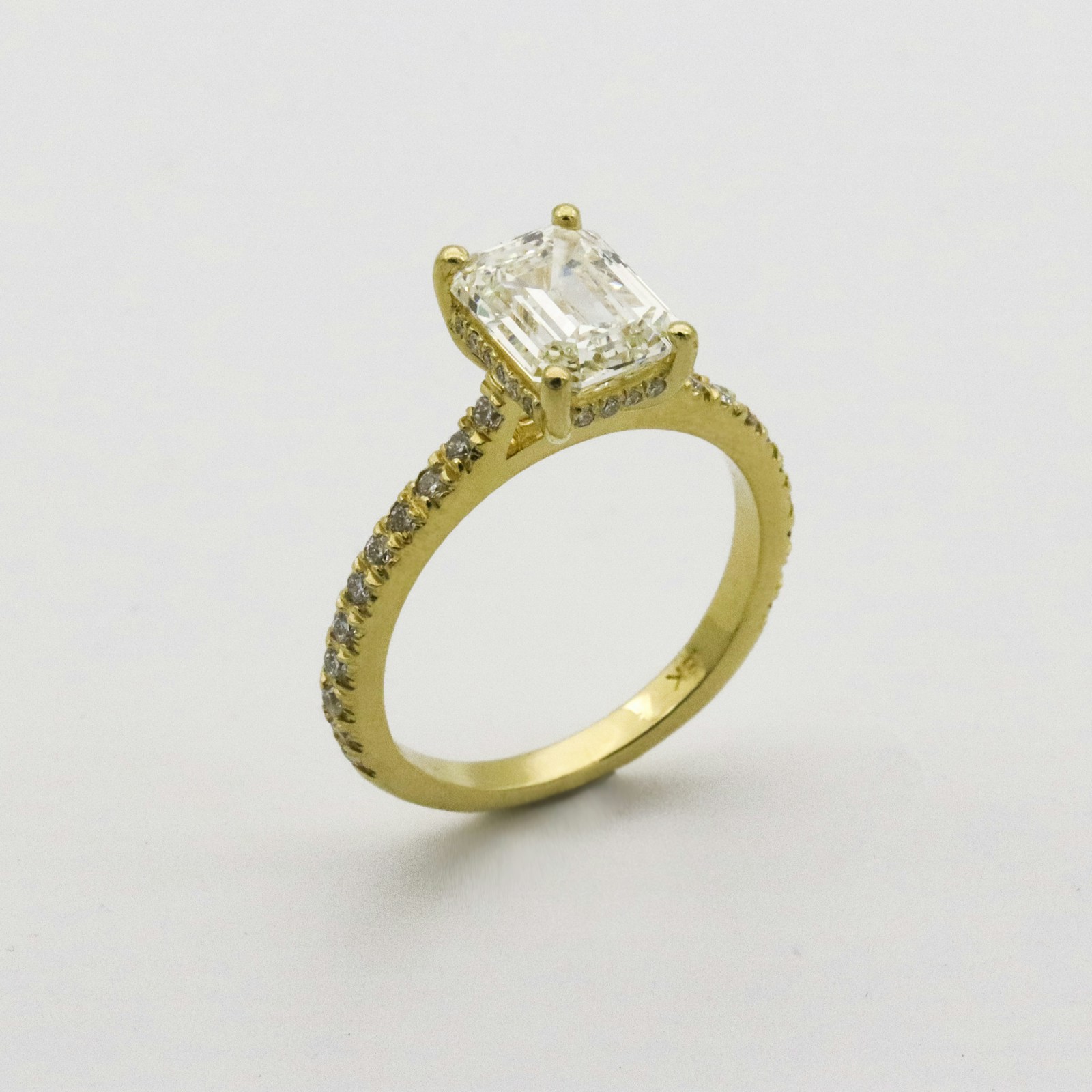 Emerald-cut ring shown as design inspiration, not current inventory